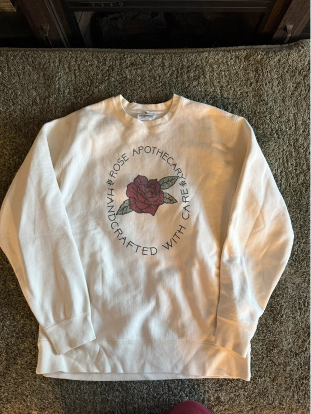 Independent Trading Company White Crewneck Sweatshirt with Rose Graphic